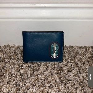 Mens coach wallet.